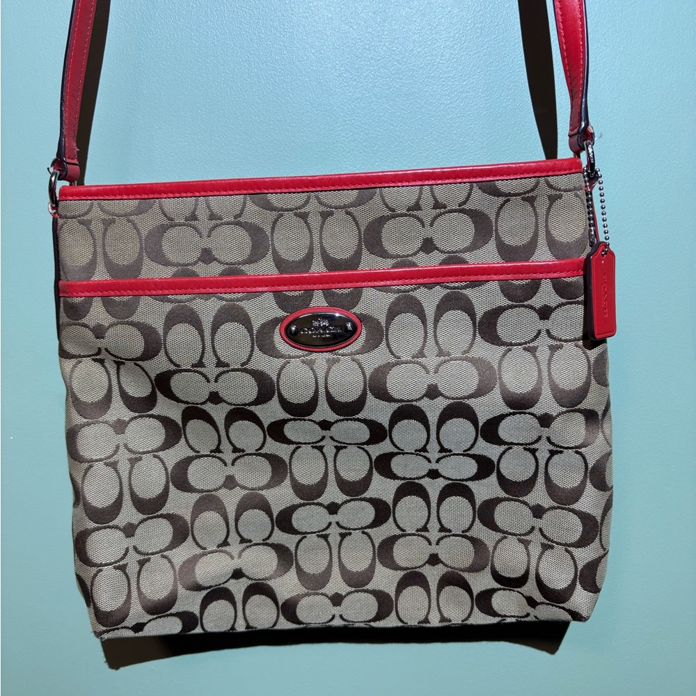 Coach Signature crossbody with orange trim